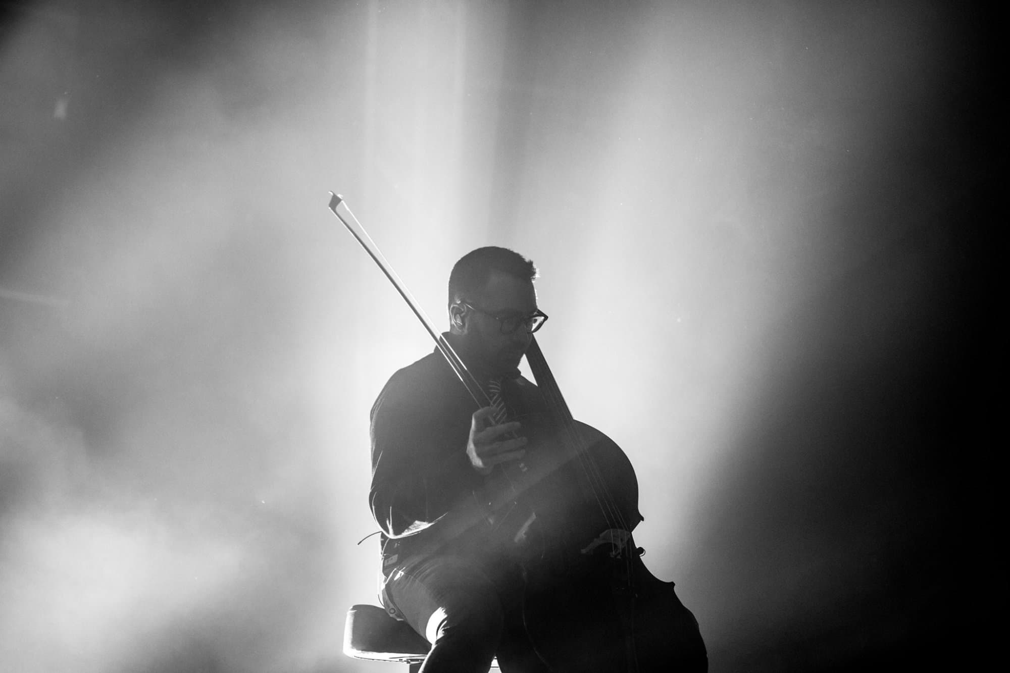 David Campbell performing cello on stage